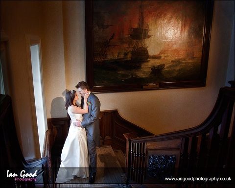 Bride and groom on the satirs at the Mansion House, Wokefield Park