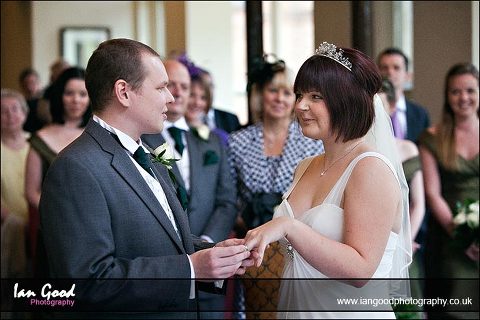 Exchange of rings at Audleys Wood wedding