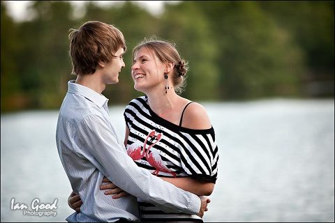 Engaged couple by lake at Eastleigh by Hampshire wedding photographer