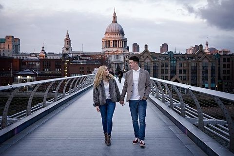 couple on engagement photo shoot with St Pauls in the background