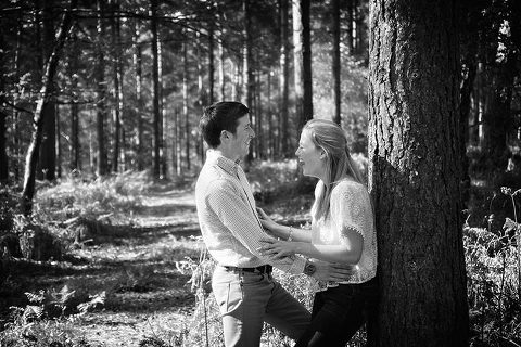 couple enjoying engagement shoot in New Forest