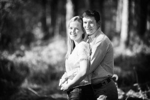 black and white engagement photo in New Forest