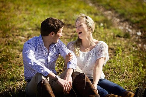 engaged couple laughing on their engagement shoot