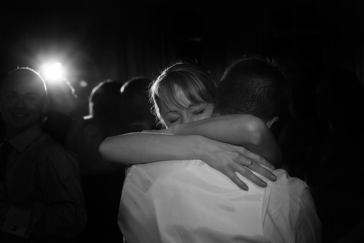 basingstoke wedding photography of bride hugging groom