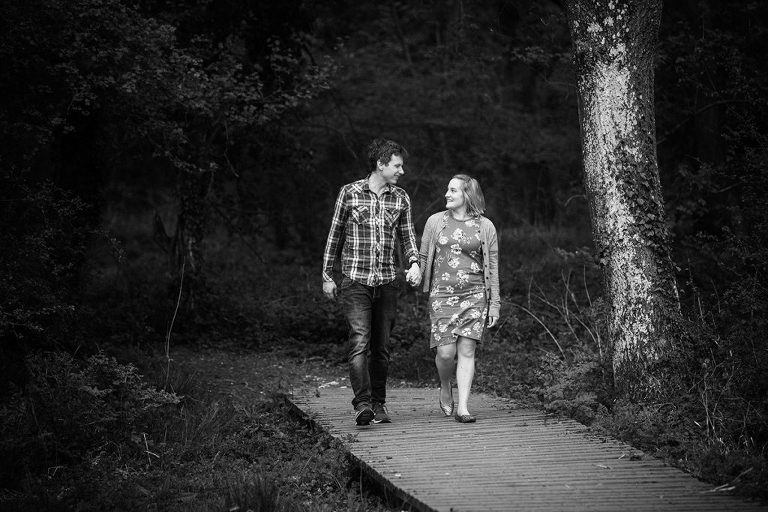 couple walking at pre-wedding photoshoot near basingstoke