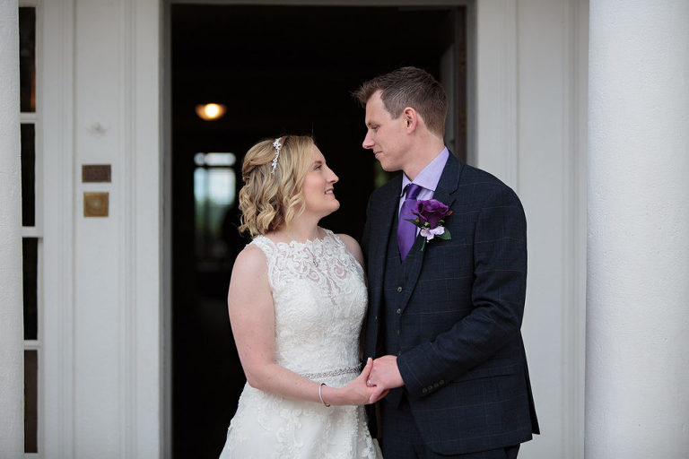couple in doorway at highfield park wedding