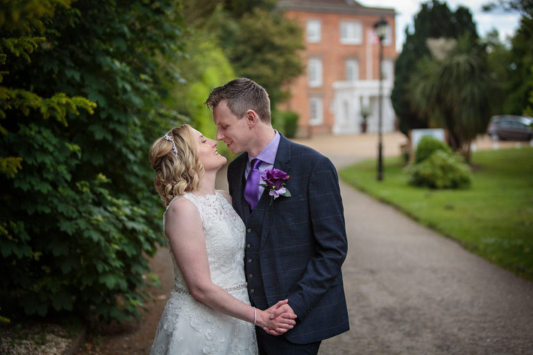 happy couple by highfield park wedding photographer