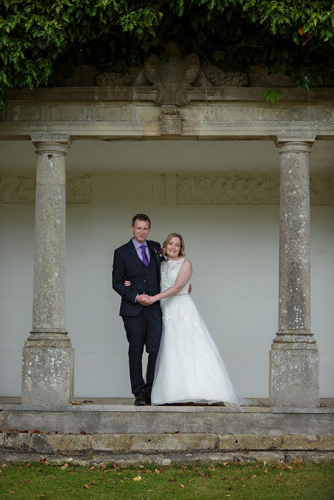 bride and groom in the folly at highfield park wedding