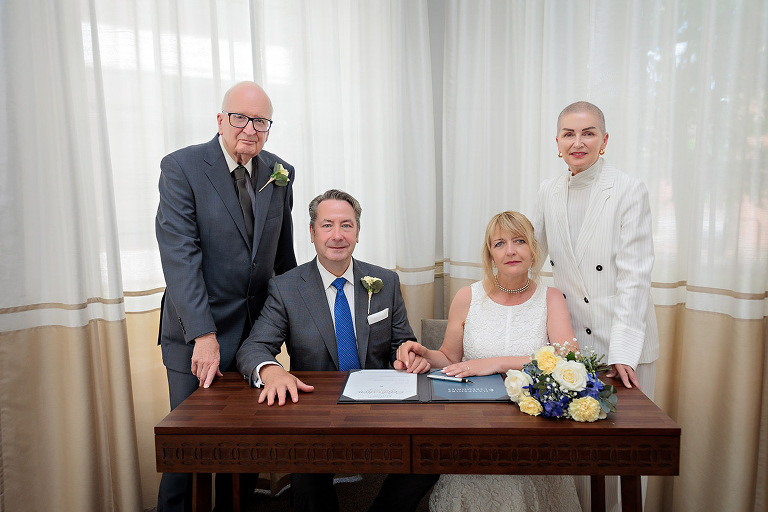 signing the register by Basingstoke register office wedding photographer