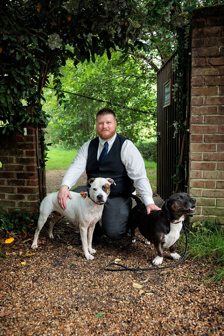 Bartons Mill wedding photography of groom with dogs