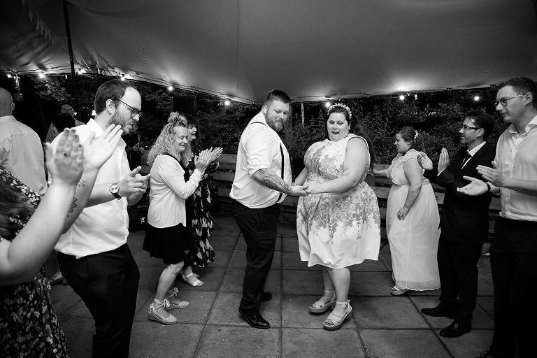 Dancing a ceilidh at old basing wedding