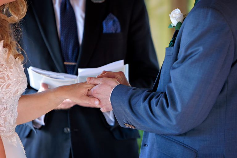putting the ring on her finger at The Wellington Arms